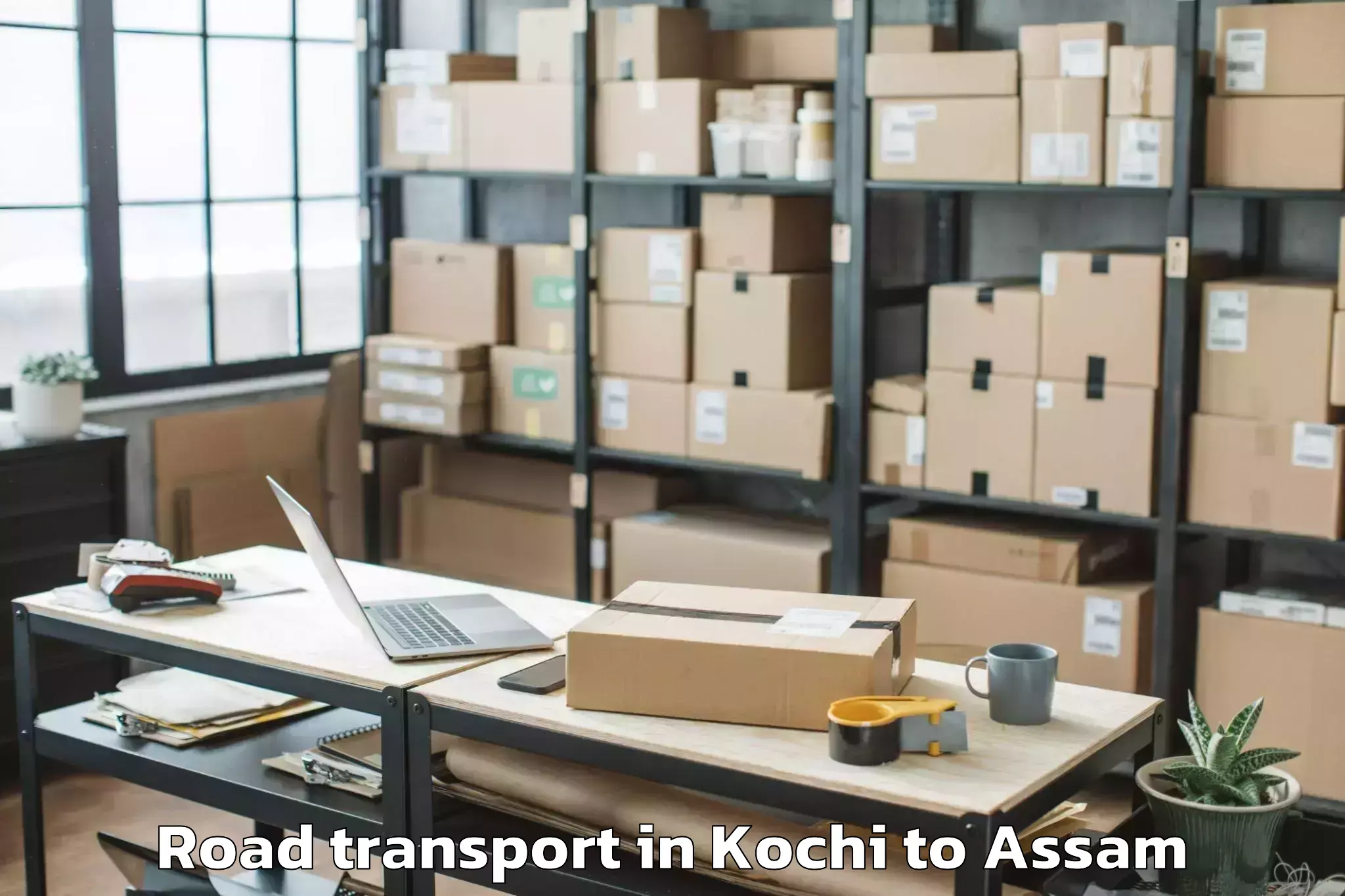 Book Kochi to Moranhat Road Transport Online